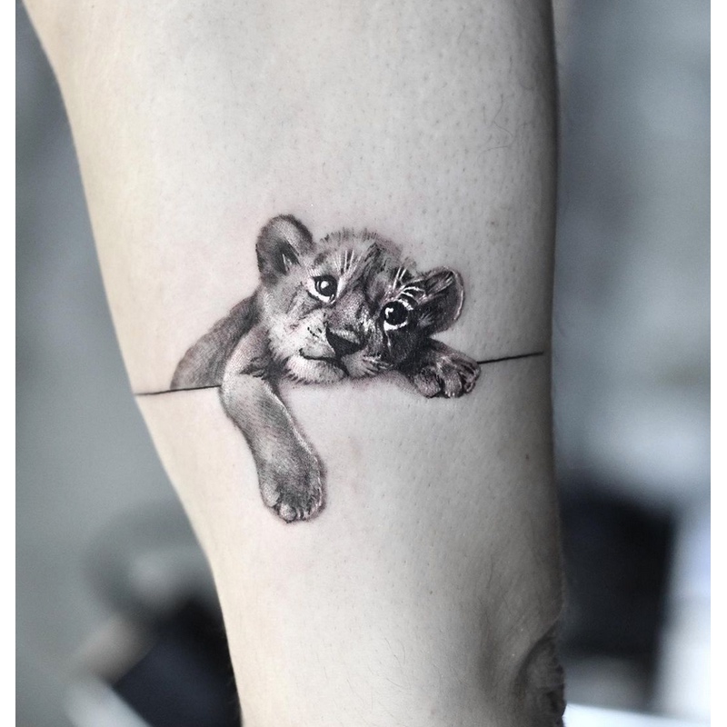 26 Lion Tattoo Meanings Lioness Lion Cub Tattoos UniGuide